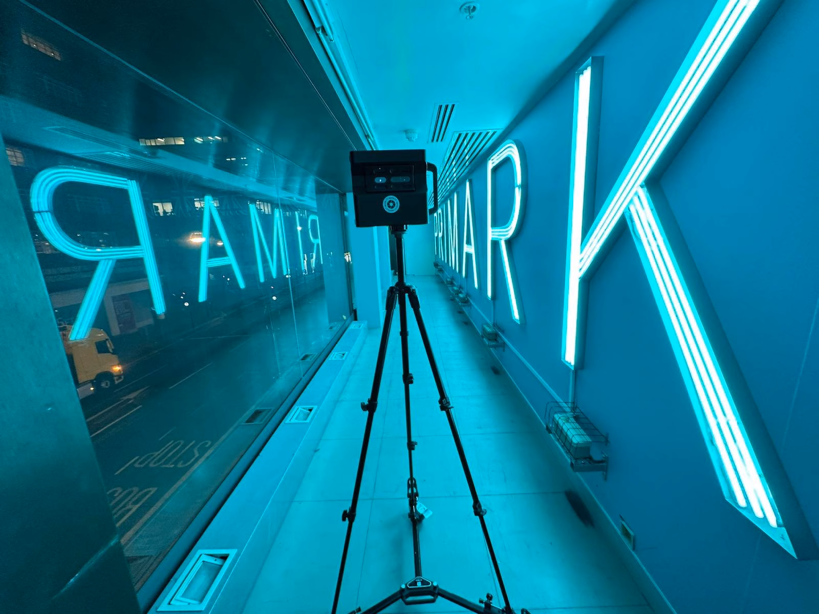 Matterport camera scanning a Primark store corridor